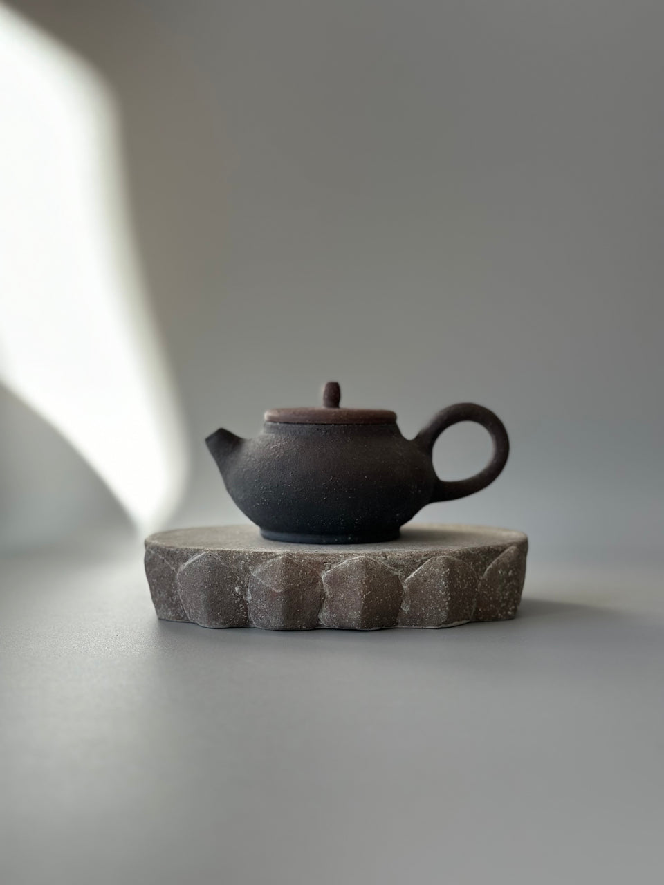 Brown and black earthy teapot