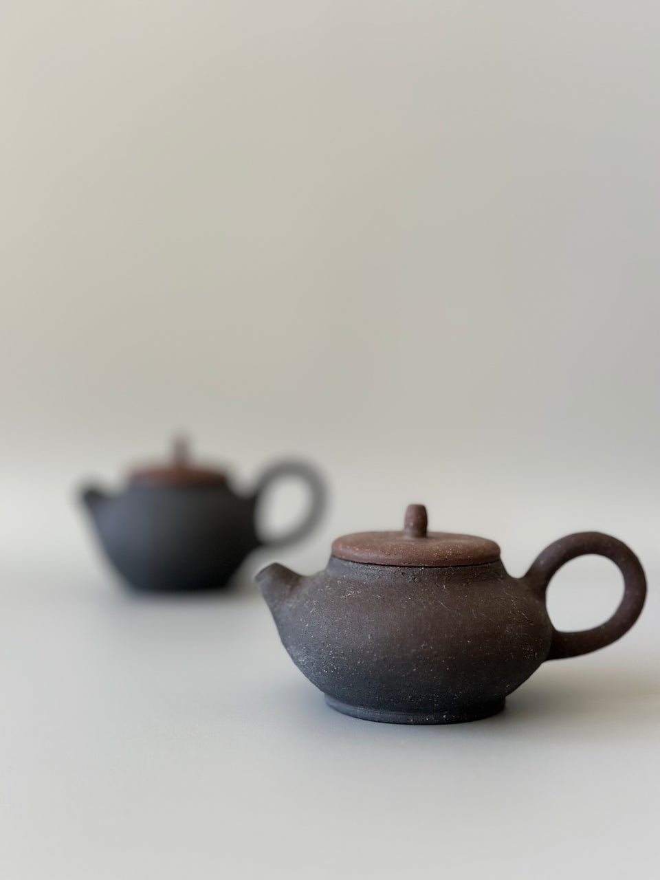 Brown and black earthy teapot