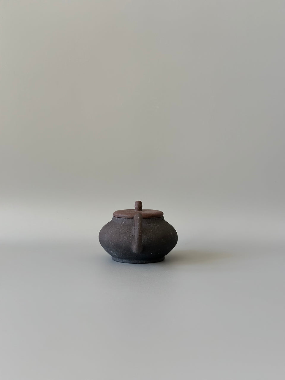 Brown and black earthy teapot